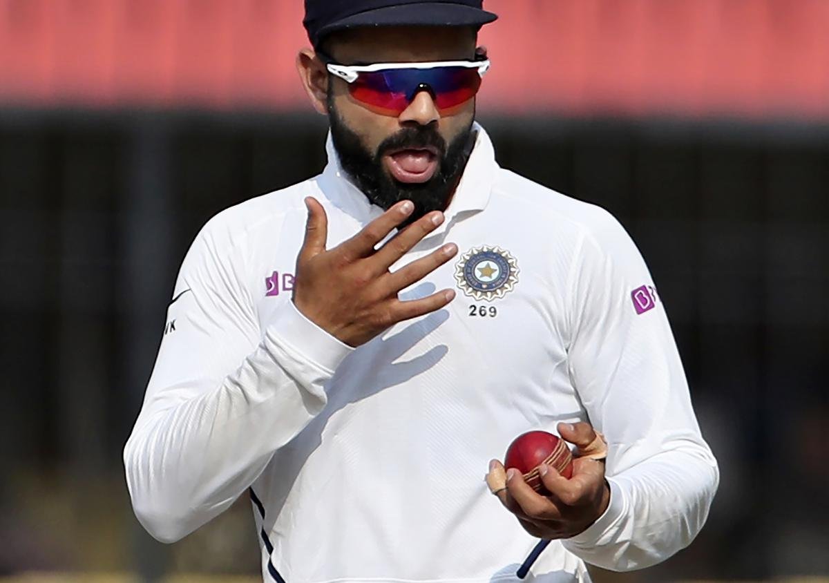 applying saliva on the ball